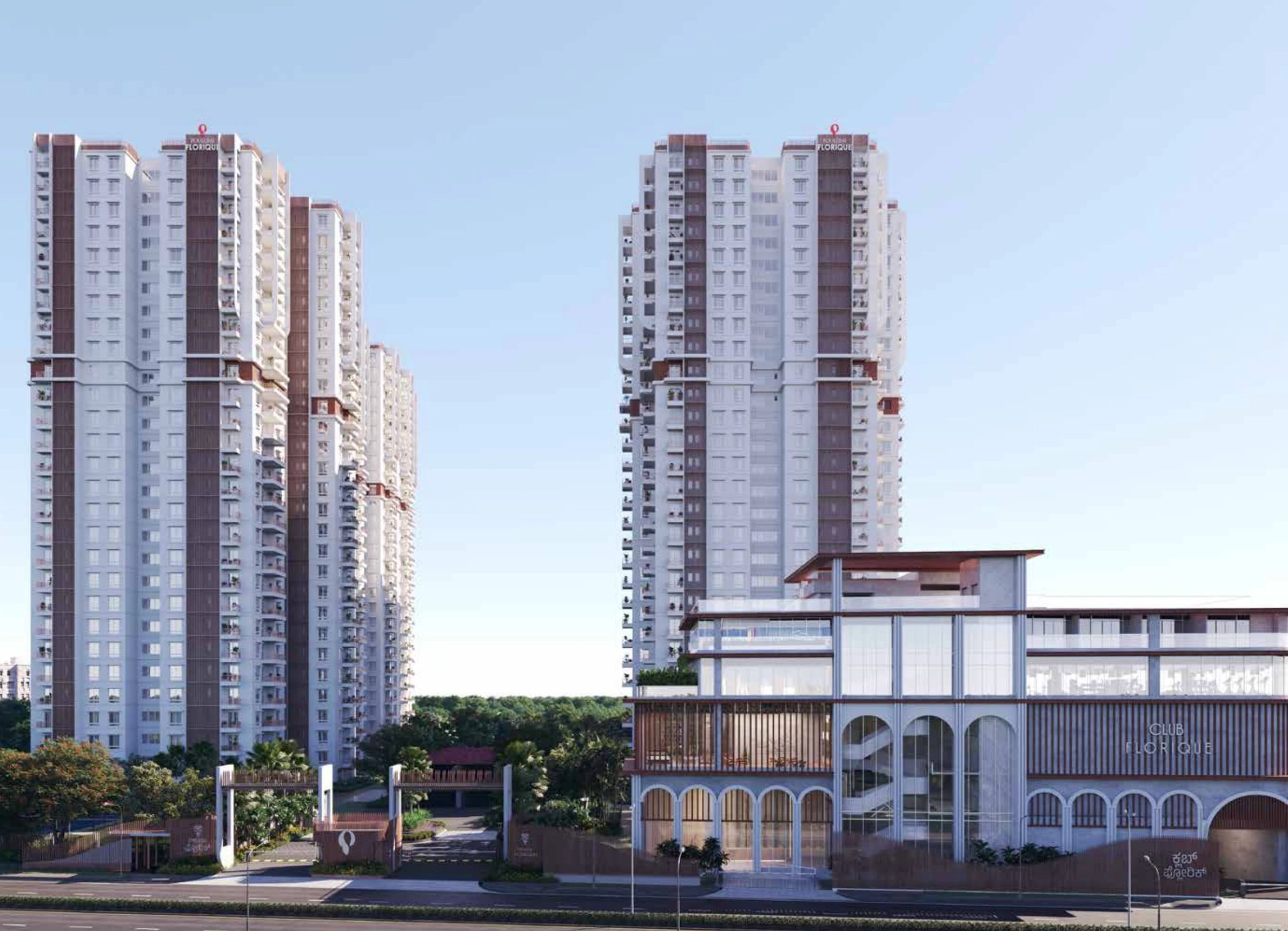 Stack of books next to pencils in a holder and a camera.