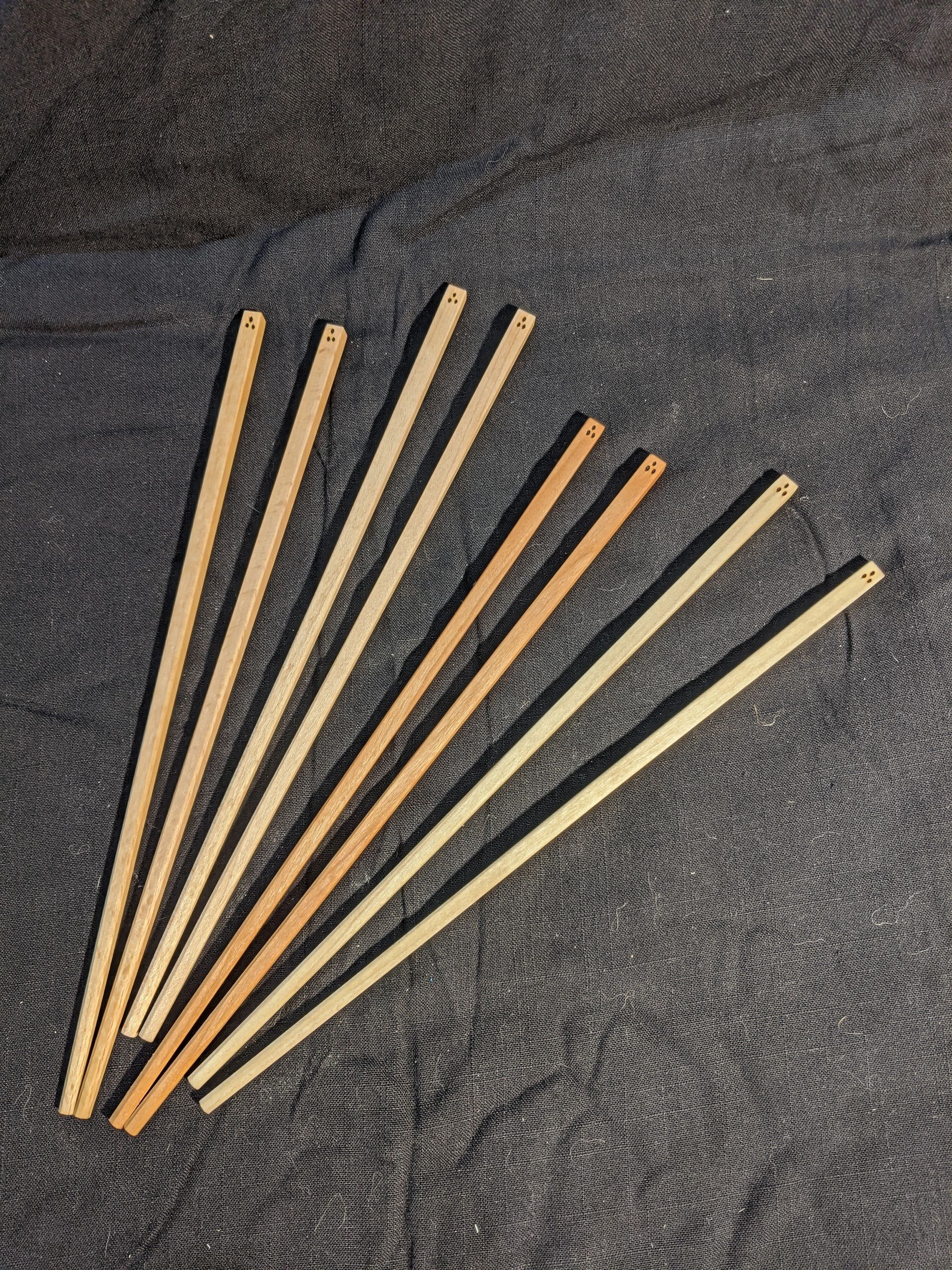 A selection of Maine hardwood chopsticks. Beech, Maple, Cherry, and Poplar