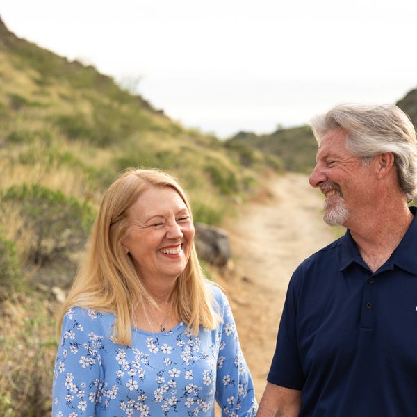 A couple in their 60's laughing together