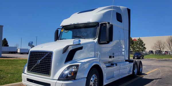 Close picture of a white color semi truck