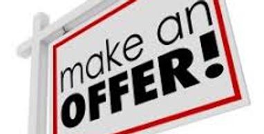 A signboard that says 'make an OFFER!' in bold letters.