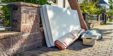 mattress before junk removal in Coachella Valley residential area.