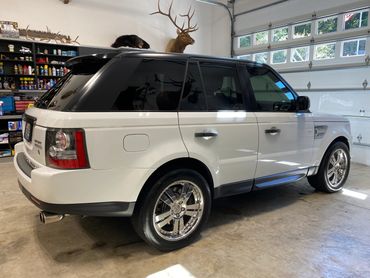 A white car inside the garage