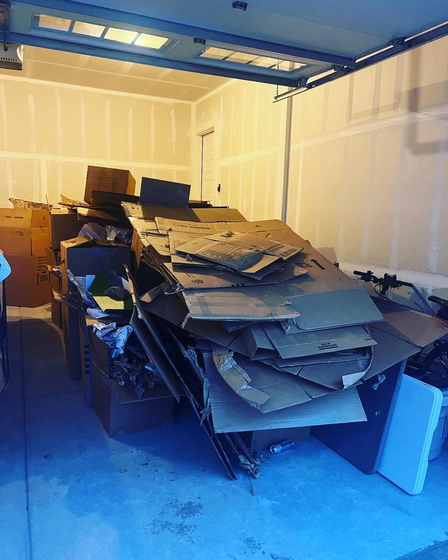 Cardboard boxes inside a garage 