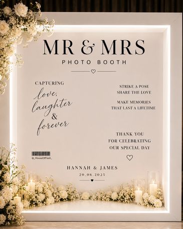 Elegant wedding photo booth sign with floral and candle decorations. Vogue luxury Editorial Photobooth's