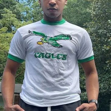 Man wear a eagles  T-shirt