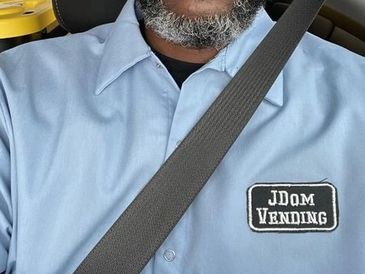 Customer wearing a custom embroidered label