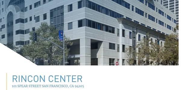 picture of the Rincon Center in San Francisco grey building with dark windows 