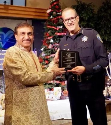 Police Chief Jason Soto, Reno Nevada, receiving Tach memento from Thakur Chakrapani Singh