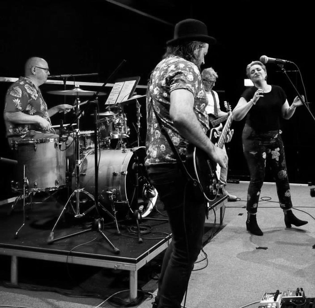 Red Belly Blue, left to right: Gavin on drums, Stevie on guitar, Dean on Bass, and Lily on vocals