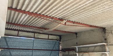 Asbestos roof sheets on garage
