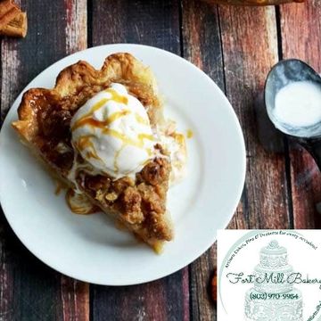 Slice of pie with ice cream and caramel drizzle.