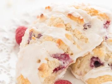Close-up of raspberry scones with glaze.