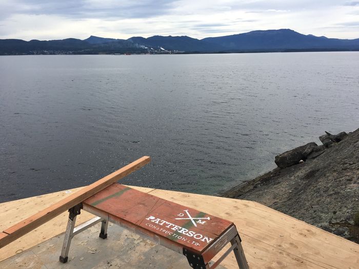 A branded DM Patterson sawhorse on a waterfront build overlooking the Saanich Inlet