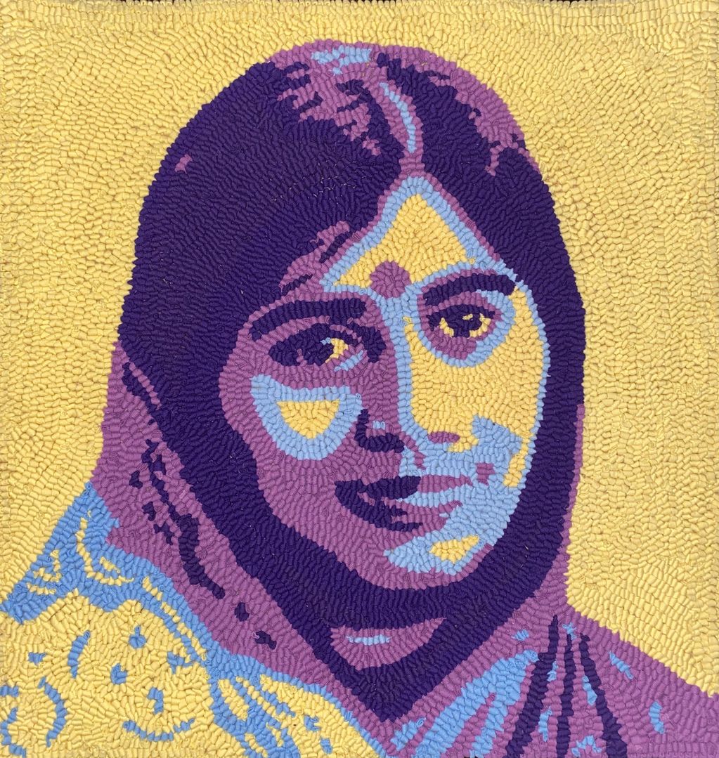 Mother Meera, repurposed t-shirts hooked on burlap backing.
2020
