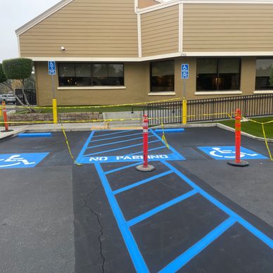 Olive Garden ADA Compliance parking lot line striping, asphalt parking lot line striping. Handicap