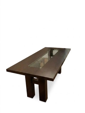 Modern wooden dining table with a glass center panel.