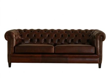 Classic brown leather Chesterfield sofa.
