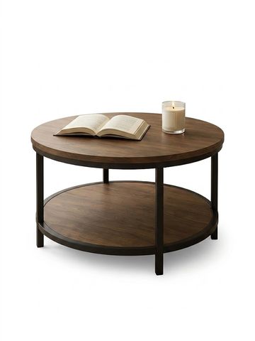 Round wooden coffee table with a book and candle.