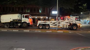 MHD Transport recovering a road sweeper at night in Cape Town