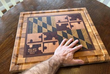 Md flag end grain.  Padauk, mulberry, black walnut, hard maple, ash, and cherry.