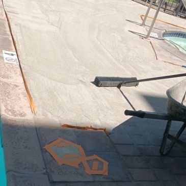 Construction work on a walkway with tools and materials.