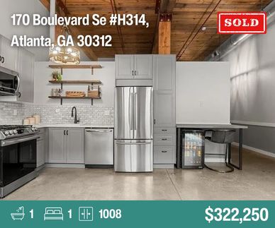 Modern kitchen with stainless steel appliances in an Atlanta apartment sold for $322,250.