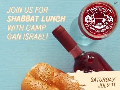 Challah and red wine bottle