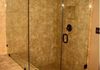 Custom Frameless Shower Door with Step Up and 90 Degree Return