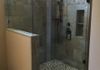 Custom Frameless Shower Door with Step up and 90 Degree Return