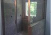 Framed Shower Door with a Stepup and 90 Degree Return