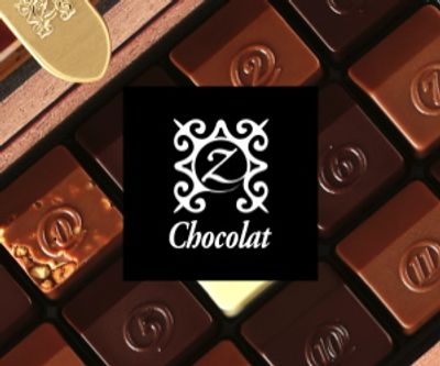 zChocolat logo and pieces of chocolate