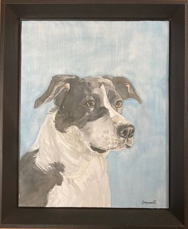 Framed watercolor painting of a black and white dog