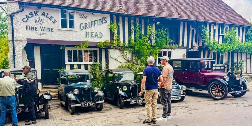 Vintage car gathering outside The Griffin's Head pub.