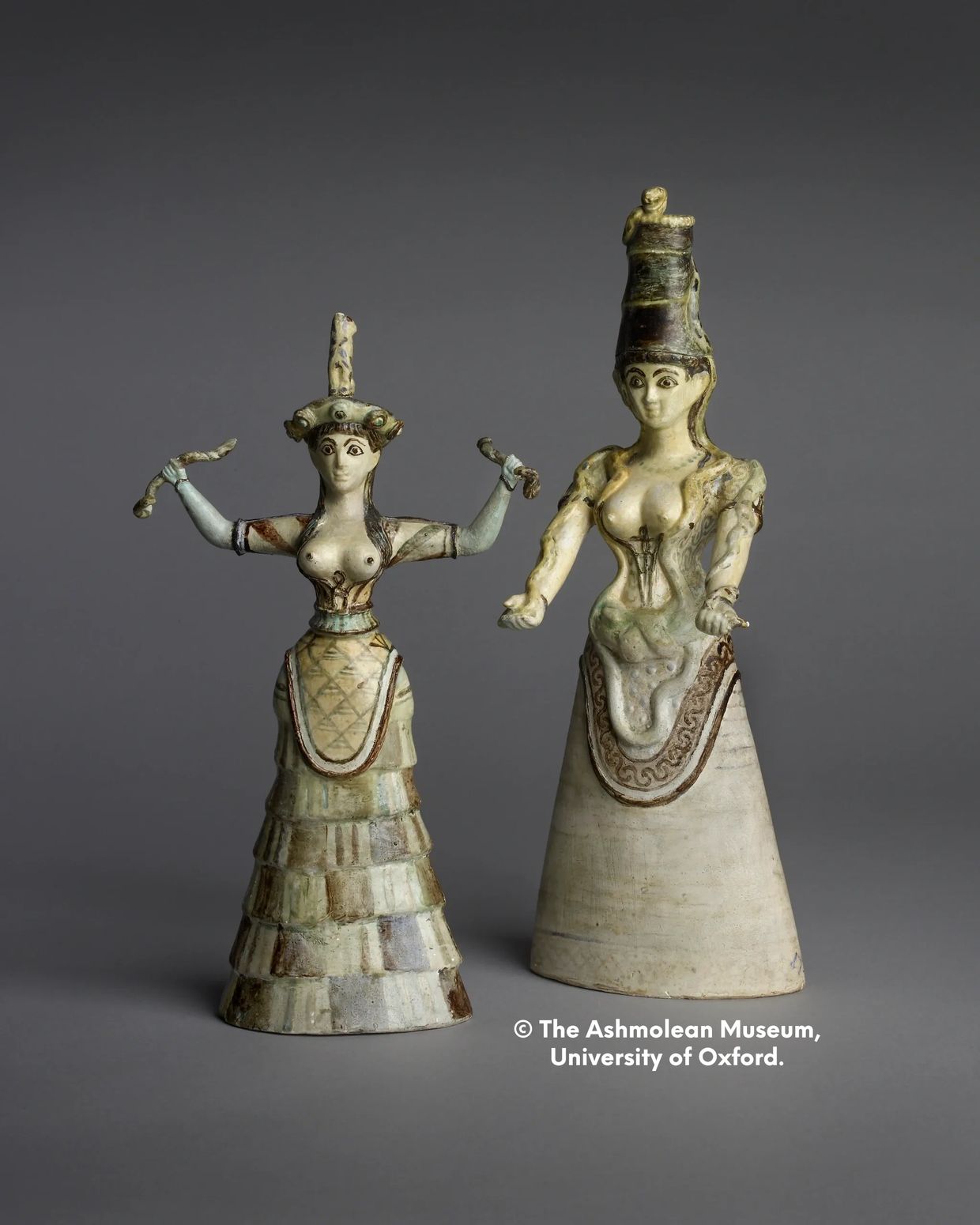 Large image of the replica Snake Goddesses in the Ashmolean Museum. 