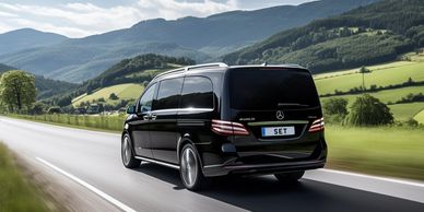 Mercedes V-Class driving along road in Derbyshire on the way to East Midlands Airport