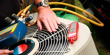 A technician using a digital multimeter to test an outdoor AC condenser.