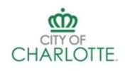 City of Charlotte logo with a green crown symbol.