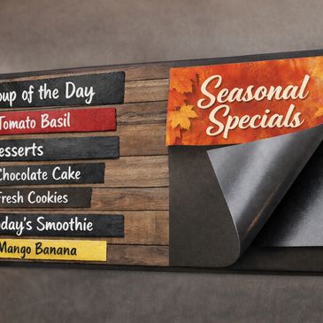 A menu board featuring seasonal specials with soup, desserts, and smoothie options.
