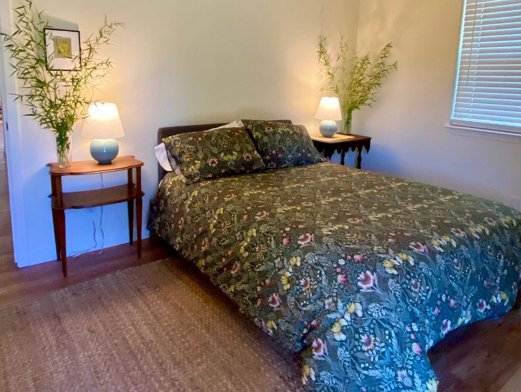 The J Mack bedroom has a door out to the garden. 
