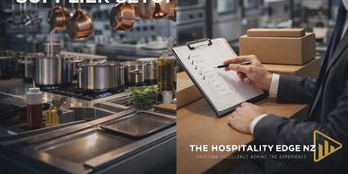 Hospitality professional reviewing checklist in modern kitchen.