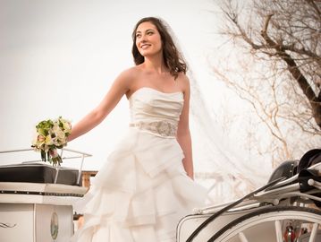 Bride on carriage. Memphis photographer. Memphis wedding photographer. Strapless wedding dress. 