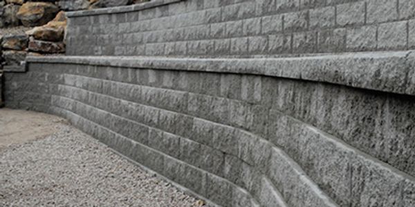 Two layers of block walls made to hold back dirt. 