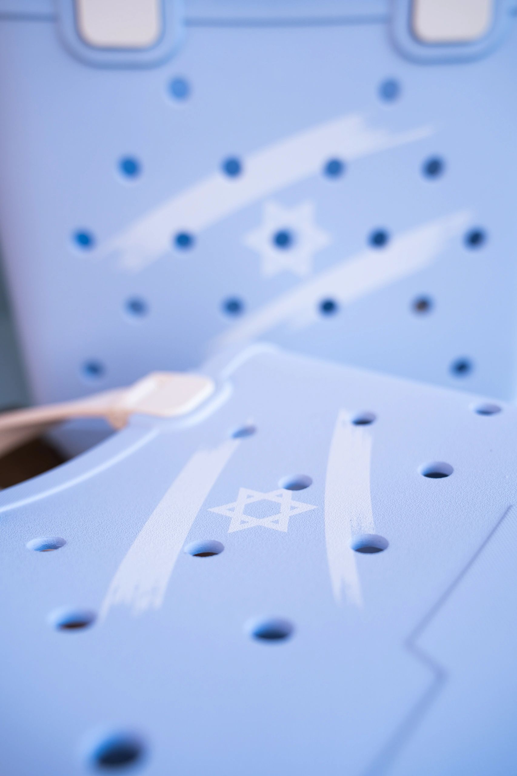 Blue chair with star and stripe design.