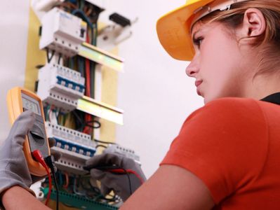 Female Electrician working