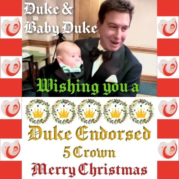 Man and baby in tuxedos wishing a Merry Christmas with festive crowns.