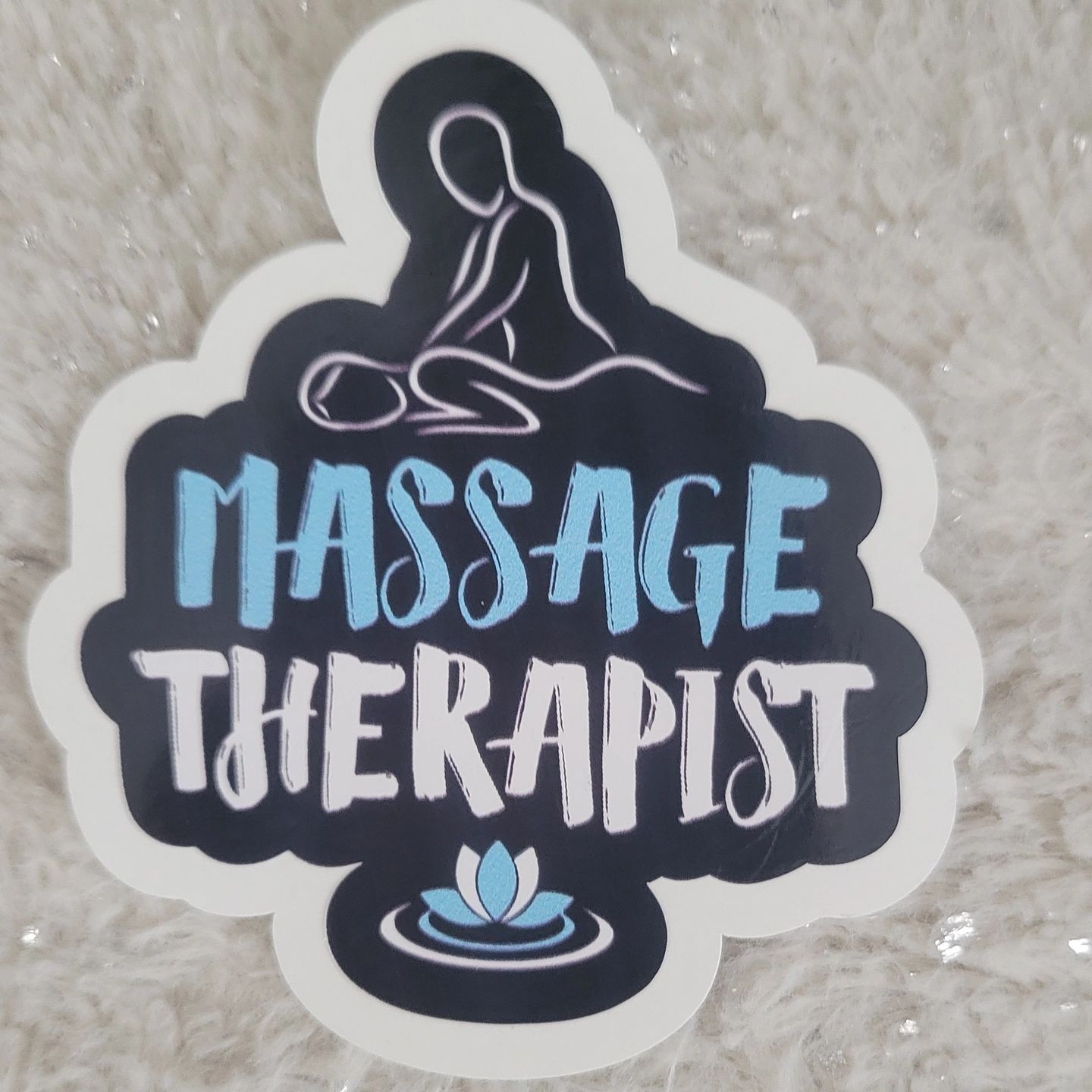 Sticker with massage therapist text and outline illustration of massage.