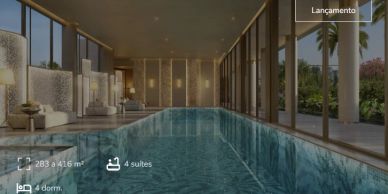Piscina interna moderna com design elegante e iluminação suave.