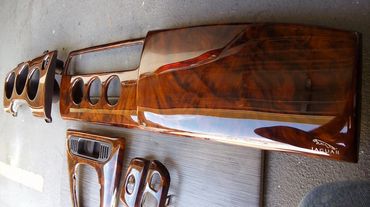This XKR wood set was stripped and re-veneered in Walnut Burl