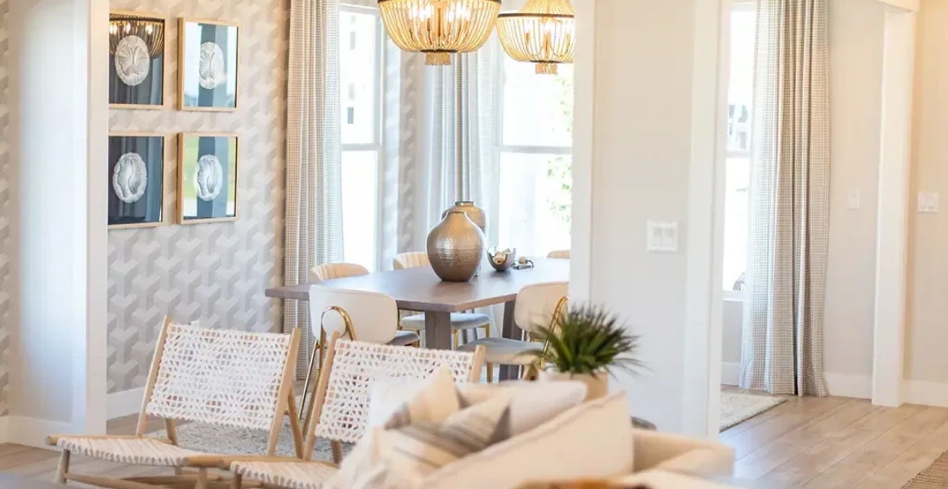 Bright, modern dining area with natural light and neutral decor.